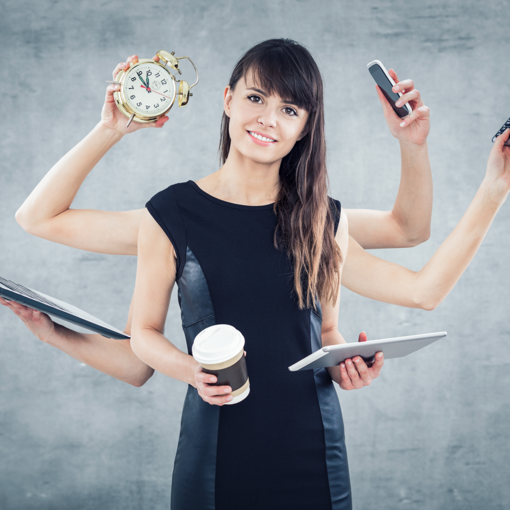 person trying to multi task time phone coffee laptop