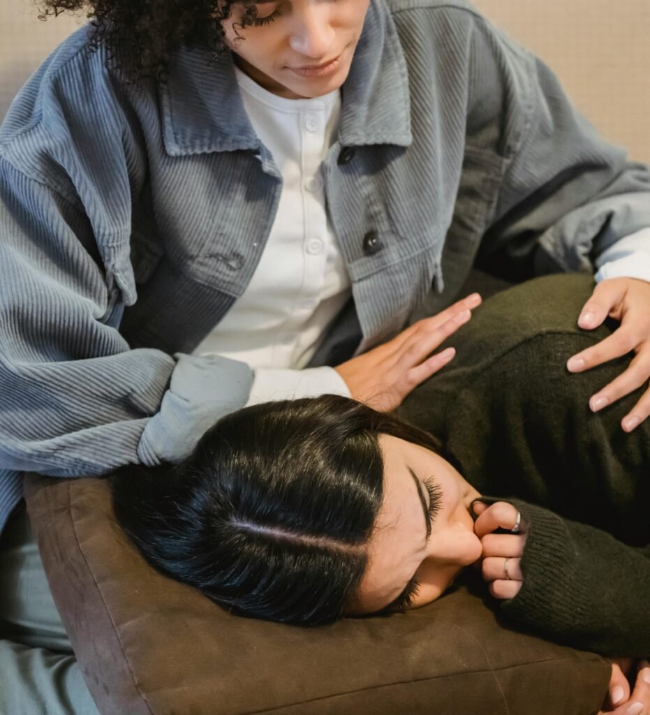 A comforting moment between friends, showcasing support and empathy.
